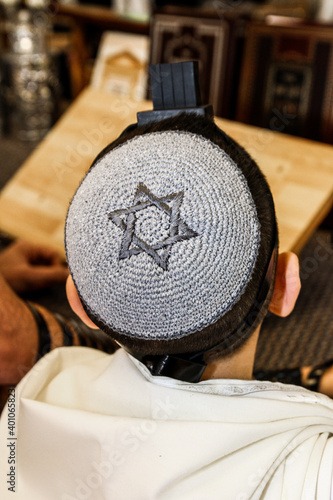 Close up of young man with bright yarmulka © דרור להט