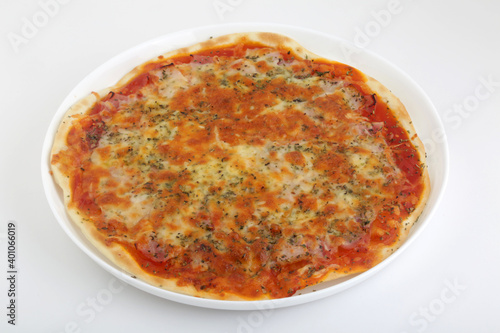 italian pizza with ham tomato and mozarella