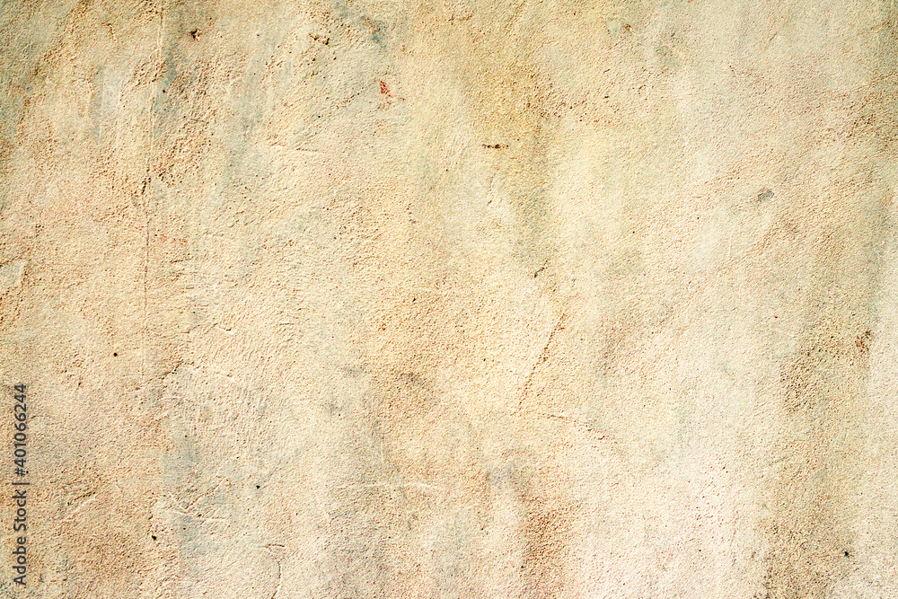 Texture of a concrete wall with cracks and scratches which can be used as a background Texture of a concrete wall with cracks and scratches which can be used as a background