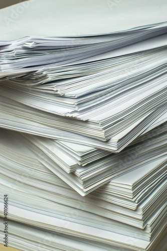 bundles bales of paper documents. stacks packs pile on the desk in the office