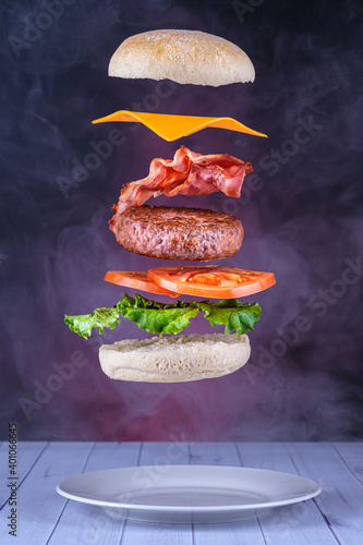Floating hamburger with bacon and cheese