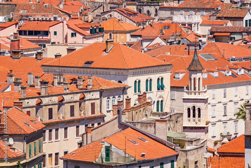 Summer mediterranean cityscape with a top view of the roofs and streets of the Old Town of Split, the Adriatic coast of Croatia