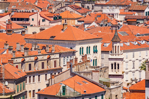 Summer mediterranean cityscape with a top view of the roofs and streets of the Old Town of Split, the Adriatic coast of Croatia