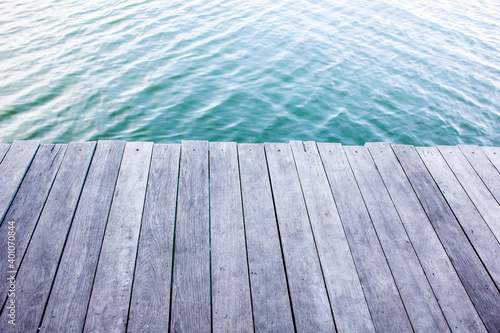 Close up plank wood table floor with natural pattern texture. Empty wooden board background. Water background