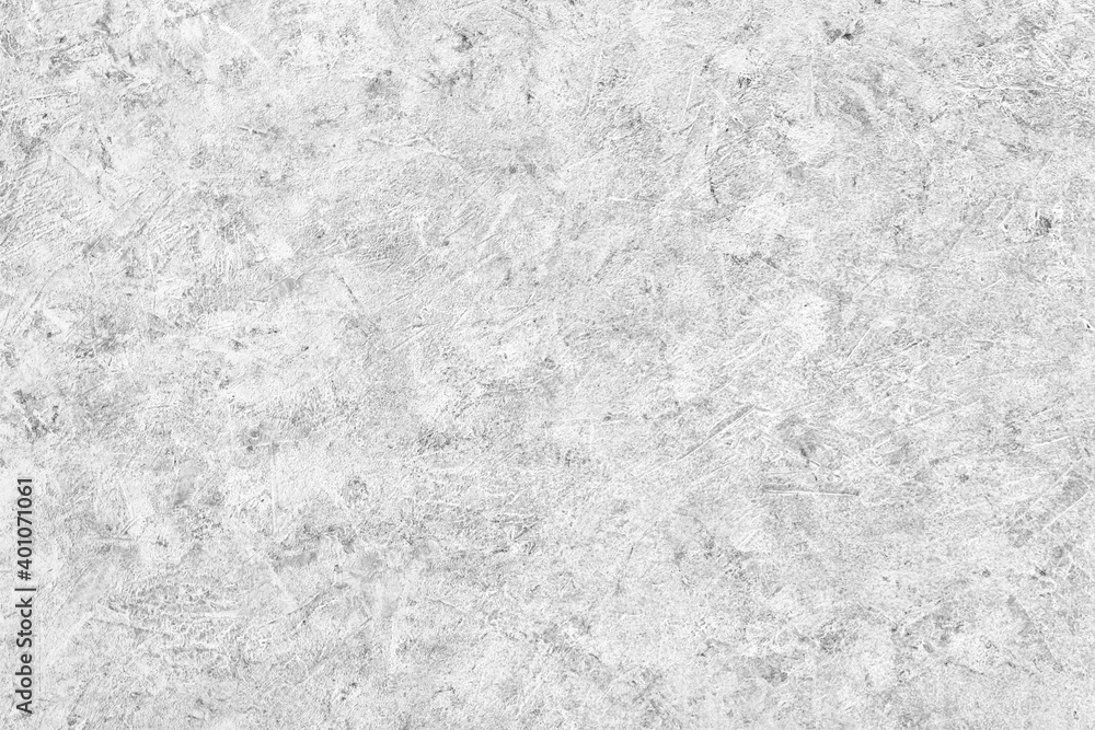 Naklejka premium Abstract light grey plastered textured grunge background in the form of a rough covered stucco wall, closeup