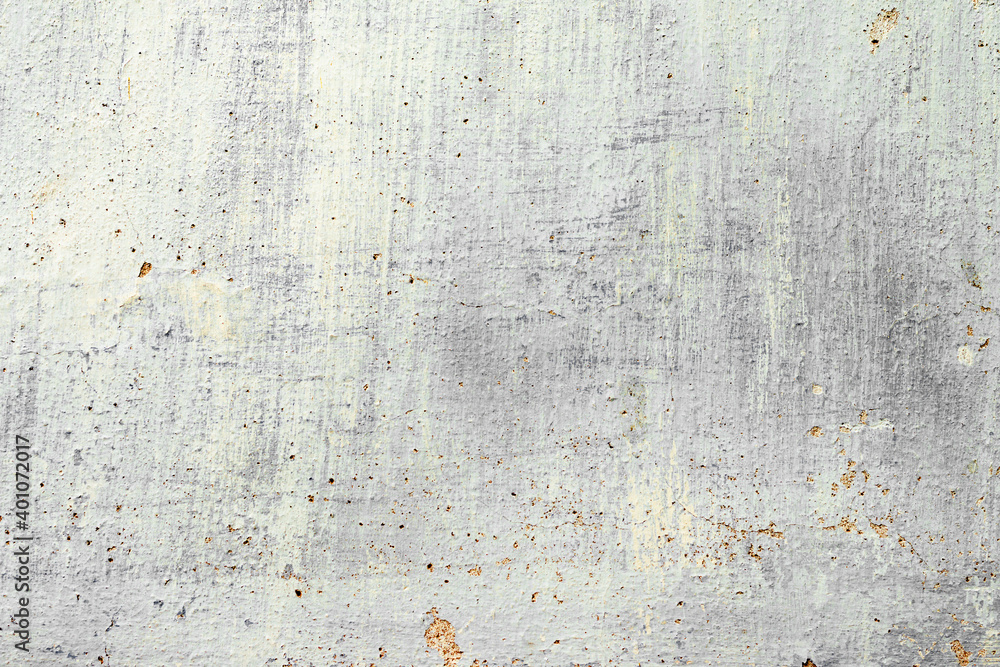 Texture of a concrete wall with cracks and scratches which can be used as a background Texture of a concrete wall with cracks and scratches which can be used as a background