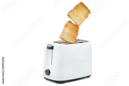Toasts jumping out of the toaster isolated on white background