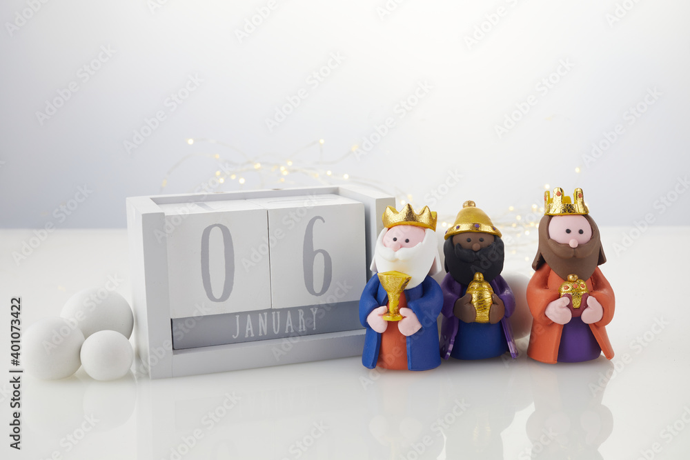 Happy Epiphany day, three kings day. Calendar with three kings on white