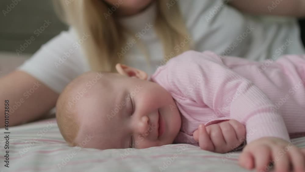 close up shot of portrait of young mother caring her newborn baby in nursery room in morning, Concept of happy family and child children, baby, parenthood, childhood, life, maternity, motherhood close up shot of portrait of young mother caring her newborn baby in nursery room in morning, Concept of happy family and child children, baby, parenthood, childhood, life, maternity, motherhood