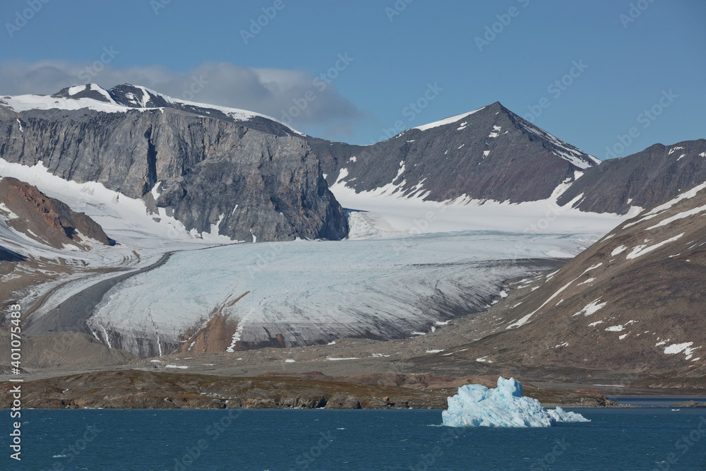 The coastline and mountains of Liefdefjord in the Svalbard Islands (Spitzbergen) in the high Arctic The coastline and mountains of Liefdefjord in the Svalbard Islands (Spitzbergen) in the high Arctic