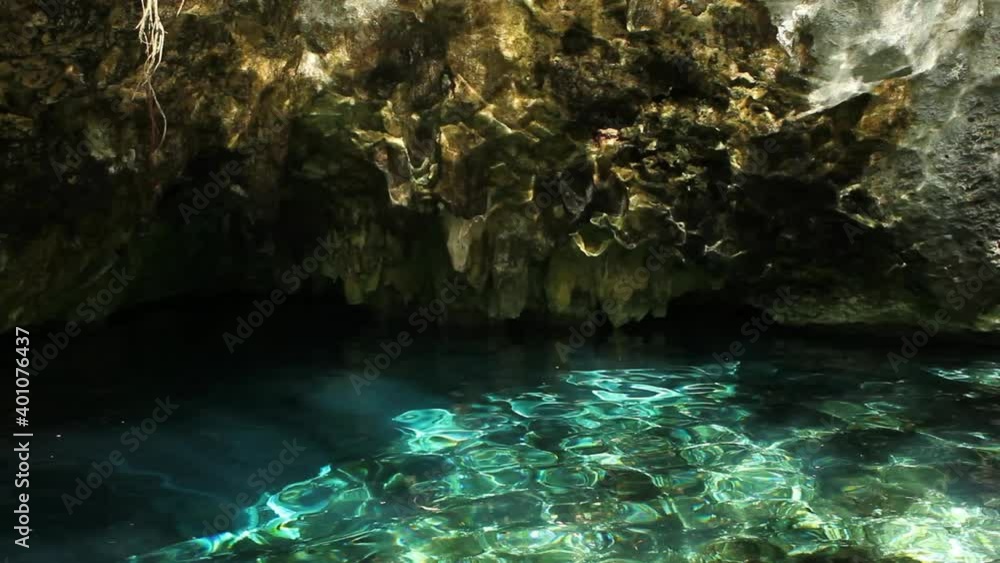 Reflection of rippling water on cave rocks, Tulum, Quintana Roo, Mexico Reflection of rippling water on cave rocks, Tulum, Quintana Roo, Mexico