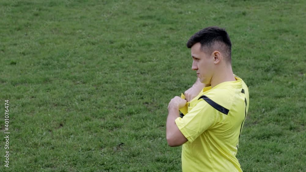Referee showing a yellow, red cards and removing player while gaming. Concept of sport, rules violation, controversial issues, obstacles overcoming. Referee showing a yellow, red cards and removing player while gaming. Concept of sport, rules violation, controversial issues, obstacles overcoming.