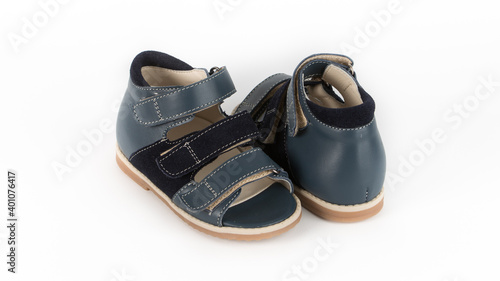 children's blue orthopedic sandals on a white background