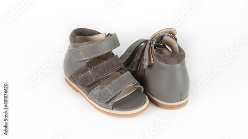 children's grey orthopedic sandals on a white background