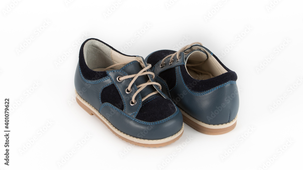 children's blue orthopedic shoes on a white background children's blue orthopedic shoes on a white background