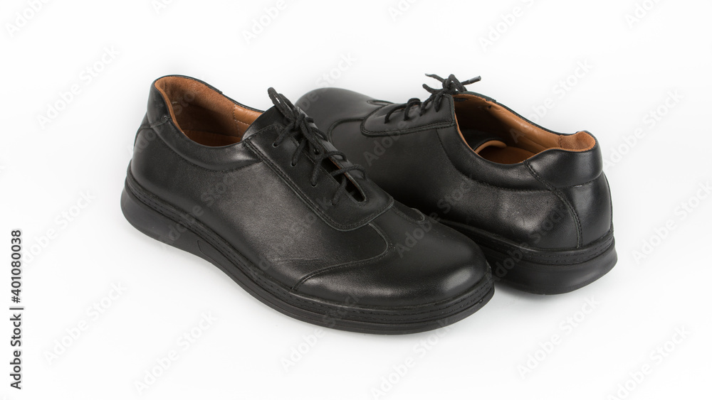 children's black orthopedic shoes on a white background children's black orthopedic shoes on a white background