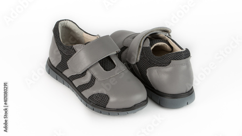 children's gray orthopedic shoes on a white background