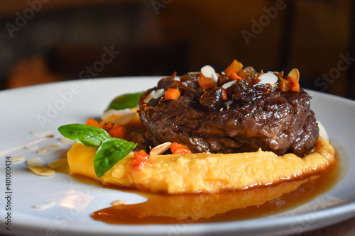 Filet mignon garnished with sweet potatoes