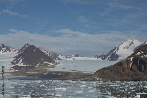 Mountains, glaciers and coastline landscape close to a village called 