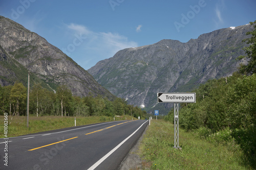 Road sign showing directions to famous tourist destination Troll Wall in Trollveggen in Norway