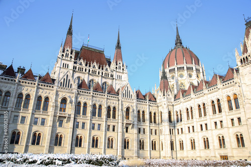 View of the parliament building in budapest on a sunny winter day. Snow in Budapest. Christmas new year.