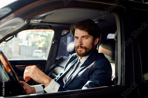 man in a suit driving a car trip road lifestyle passenger © SHOTPRIME STUDIO