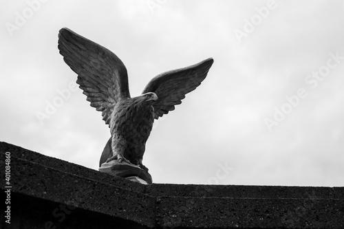 Stone eagle statue with sky as background