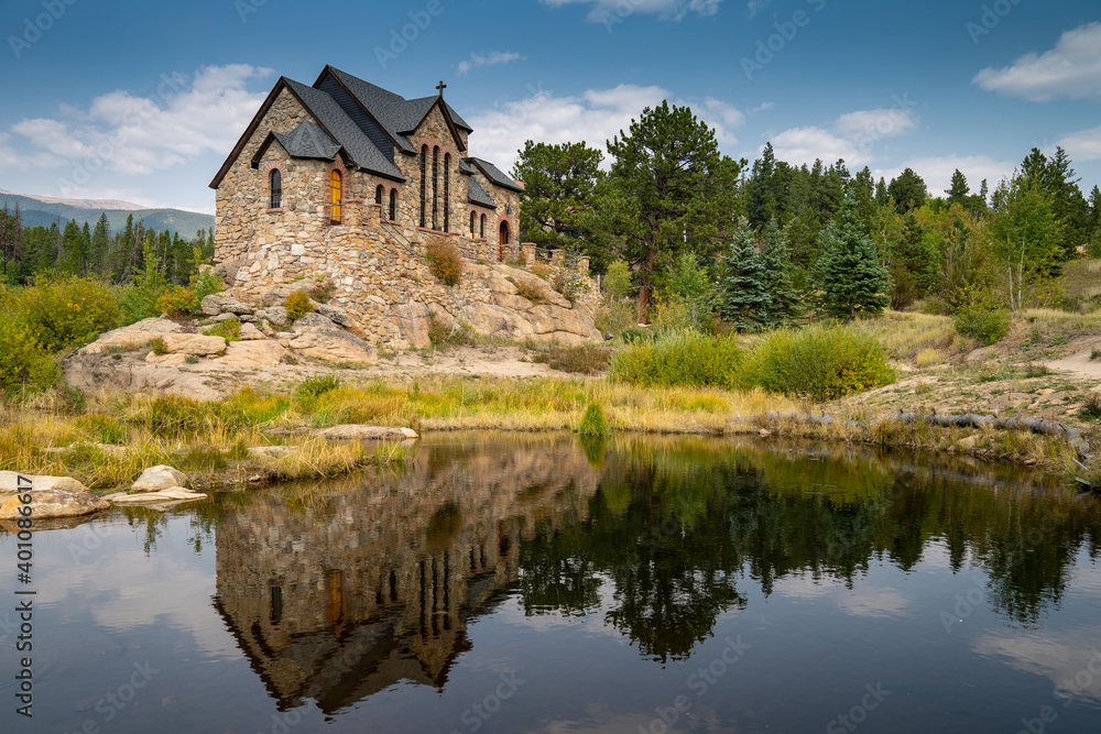 St Catherines Chapel on the Rock Church in the Rocky Mountains of Colorado, reflection in lake