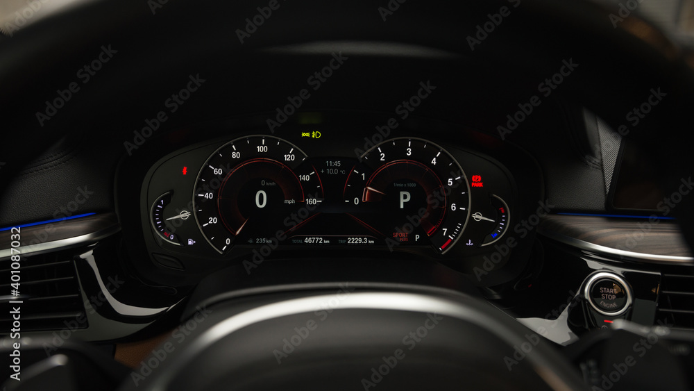 Close up image of car dashboard. Interior detail. Car Speedometer.