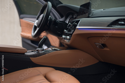 Luxury modern car background. New car dashboard. Interior detail.