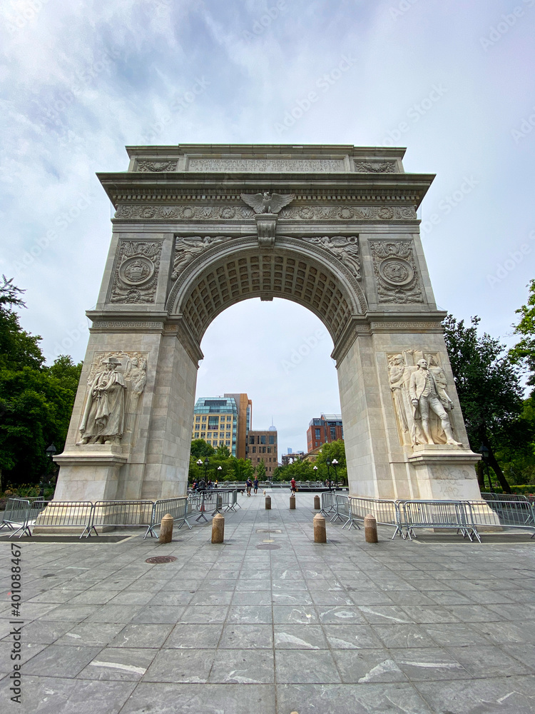 Washington square park monument on a cloudy day