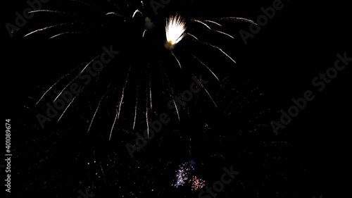 New year celebration of 2021 in midnight with sparkling fireworks and burining sparkles in the sky photo