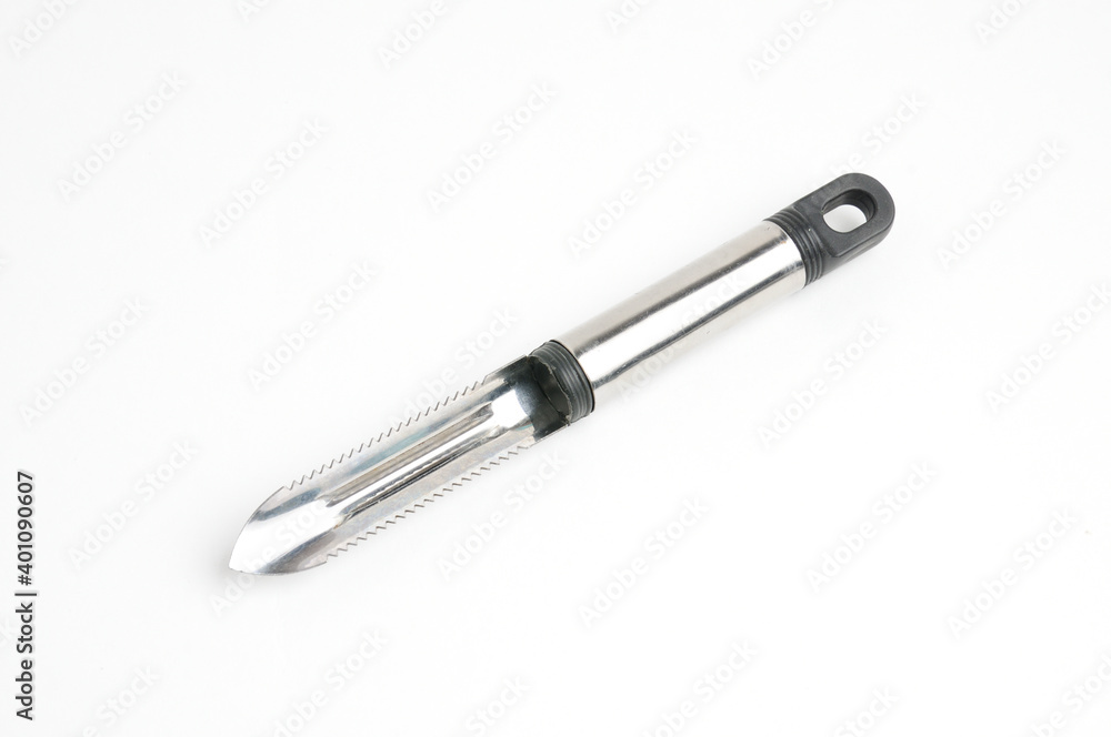 Fruit and vegetable scraper on a white background Fruit and vegetable scraper on a white background