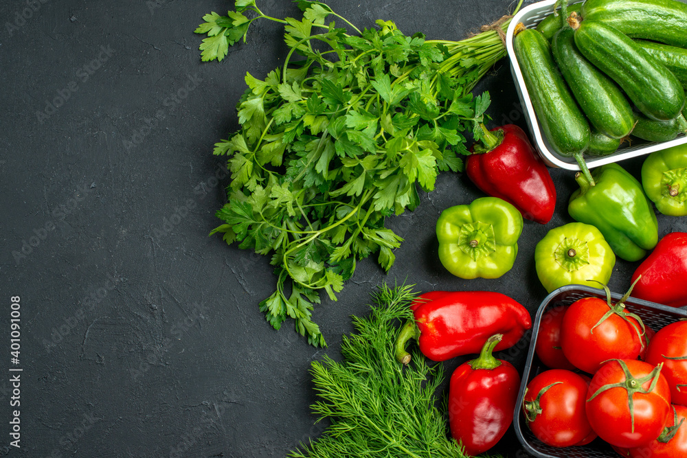 top view fresh red tomatoes with greens and bell-peppers on dark background meal salad color photo ripe top view fresh red tomatoes with greens and bell-peppers on dark background meal salad color photo ripe