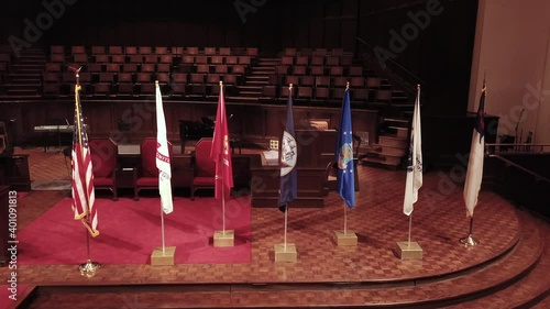 US and Military Flags On Stage Rise Up Tilt Down