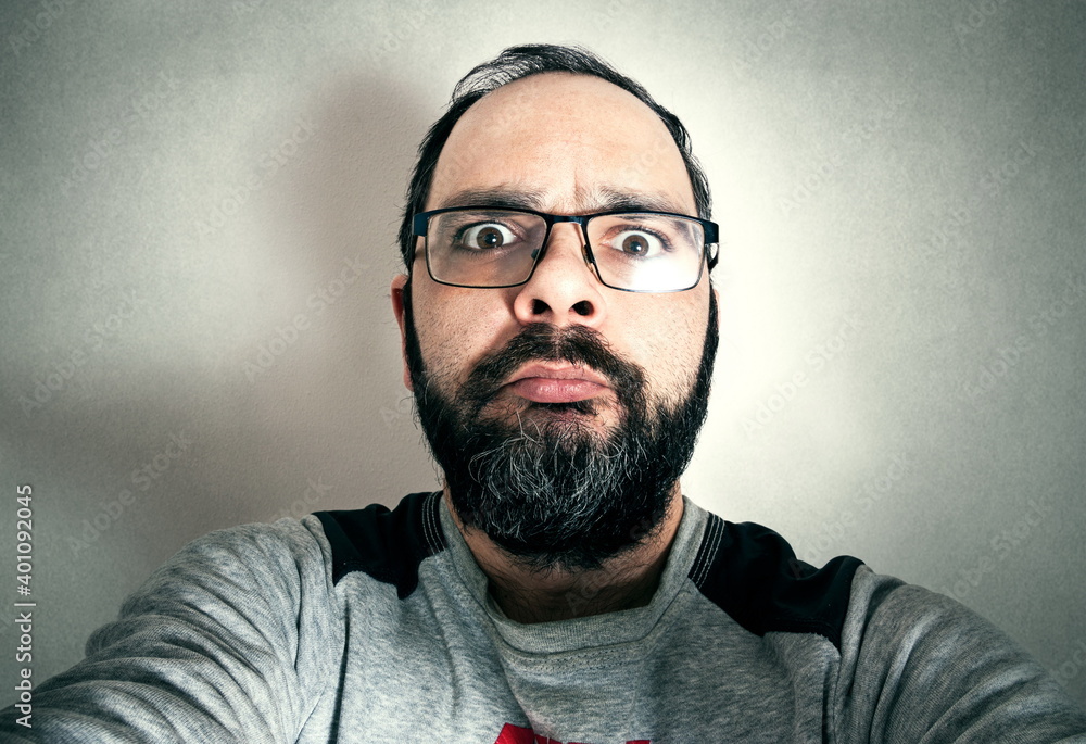 Fototapeta premium Funny man with the beard making expressions