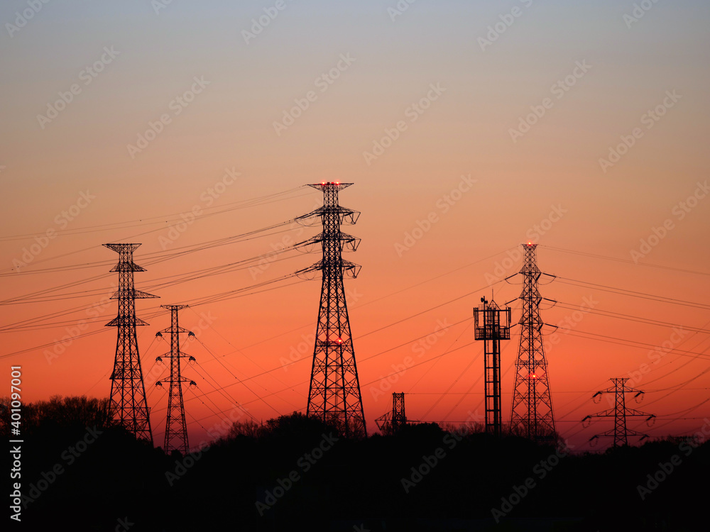 Tokyo,Japan-December 23, 2020: Electric Transmission Towers at winter dawn in Tokyo
