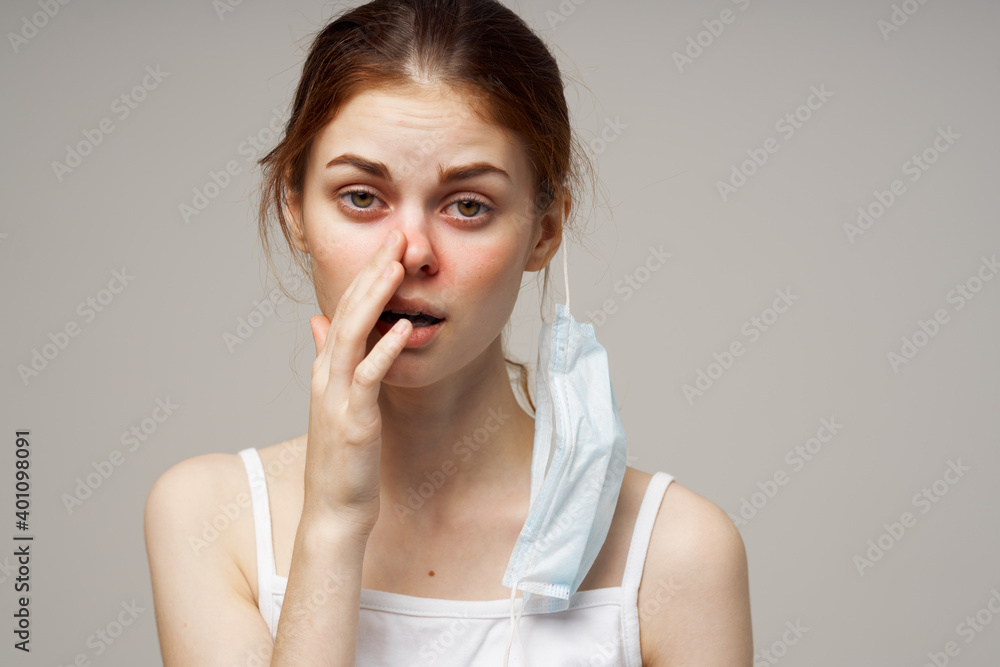 woman with medical mask runny nose infection cold health problems woman with medical mask runny nose infection cold health problems