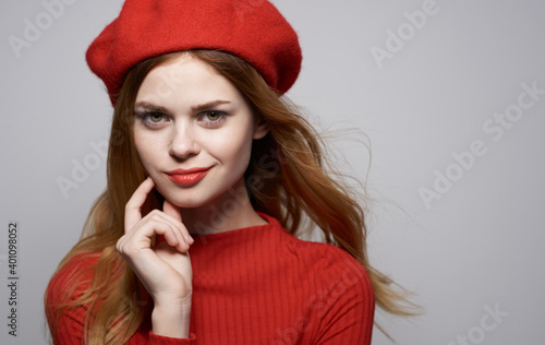 Pretty woman in red dress luxury glamor attractive look cropped view Studio
