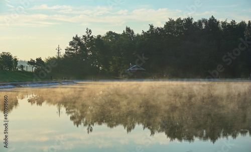 Fog over an outdoor swimming pool in the morning