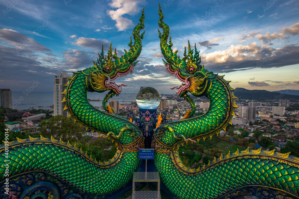 Fototapeta premium Wat Khao Phra Kru,Landmark of sriracha city with two of great Nagas guarded entrance to the view point and the crystal ball that gives an inverted view of the Sriracha scenery,Chonburi,Thailand