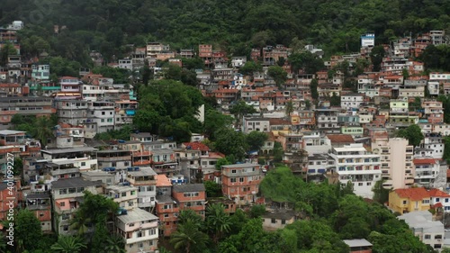 Wallpaper Mural Rio de Janeiro, Brazil. Rio's favelas surrounded with forested hills. Residential district where people living below the poverty line. High quality 4k footage Torontodigital.ca