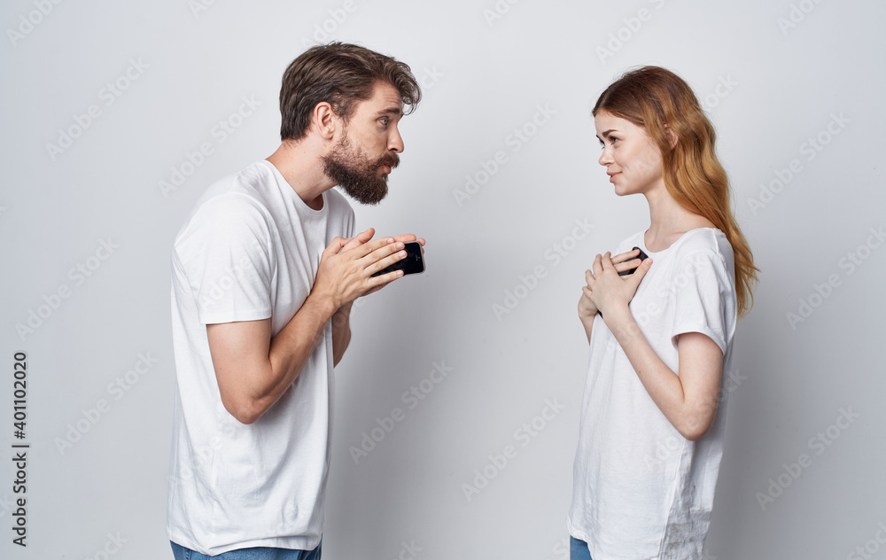 young couple with phones technology communication friendship lifestyle young couple with phones technology communication friendship lifestyle