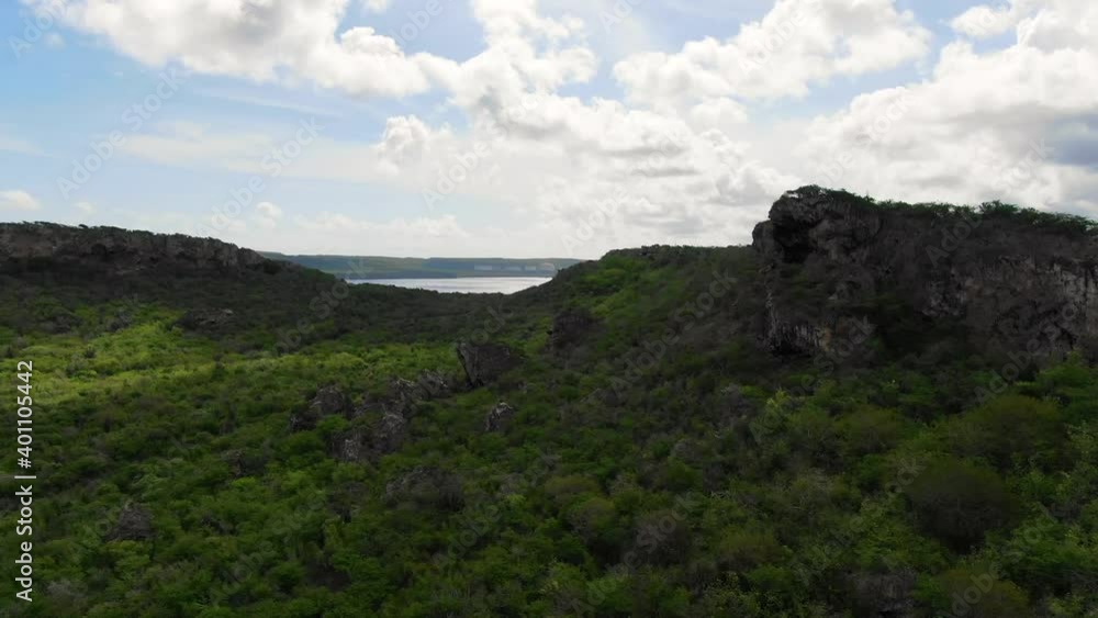 Drone shot of hiking trail in a valley in the caribbean Drone shot of hiking trail in a valley in the caribbean