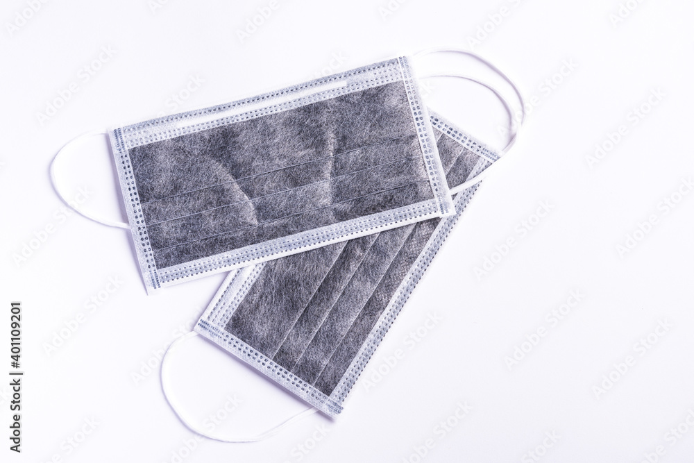Medical carbon protective face mask for cover mouth, studio shot isolated on white background, Safety healthcare medical prevent coronavirus or Covid-19 Medical carbon protective face mask for cover mouth, studio shot isolated on white background, Safety healthcare medical prevent coronavirus or Covid-19