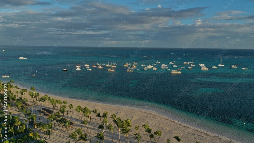 Boats parked on the water near the beach in the morning at dawn Boats parked on the water near the beach in the morning at dawn