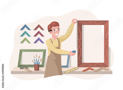Young smiling man in safety glasses measuring size of a picture frame vector flat illustration. Art store, picture frame shop interior design with wooden and plastic frames. Creative hobby concept.