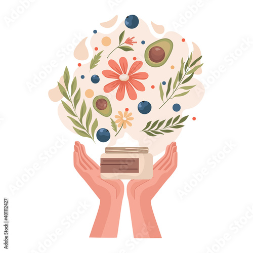 Hands holding jar with natural organic cream full of fresh herbs, flowers, and avocado oil. Products for women beauty. Organic products for beauty spa procedures and self care.