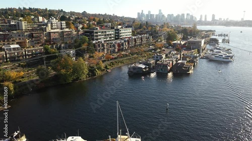 Aerial - drone footage of houseboats and yachts by the marina on Lake Union with Capitol Hill, Eastlake, near downtown Seattle in King County, Washington photo