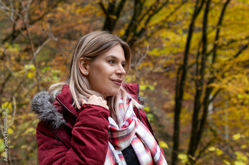 Woman in the park, autumnal background